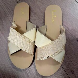 Lulu's Cream Sandals with Fringe and Crossover Straps